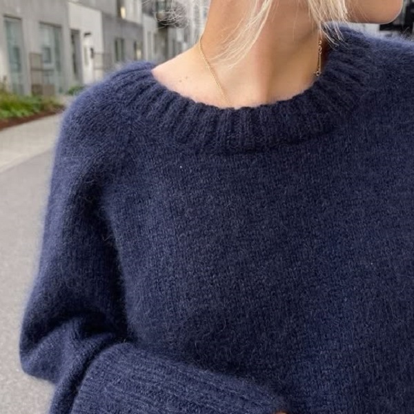 Discover the warmth and style of a knitted sweater